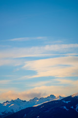 Early Sunset in Snow covered Mountain Landscape