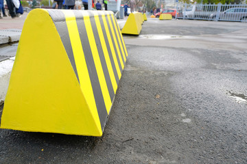 Modern barrier fence for cars in summer Parking on the street