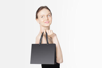 Black Friday Sales Concept with Young Woman and White Black Bags