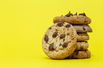  Delicious chocolate biscuits, American biscuits, with yellow background.