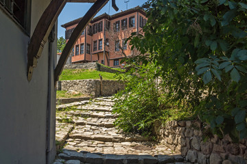 Fototapeta na wymiar Typical street and houses from the period of Bulgarian revival in old town of city of Plovdiv, Bulgaria