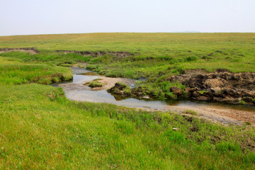 small river in the WuLanBuTong grassland, China