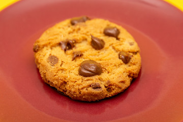 tasty cookies in detail, with red background.