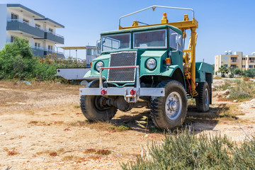 Old blue truck on blue sky background
