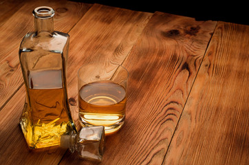 Glasses for whiskey on a wooden table