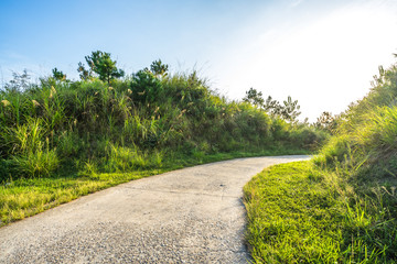 empty asphalt road with city skyline