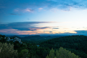 Fototapeta na wymiar Sunset panorama of the Alpilles region near the village of Les-Baux-De-Provence, France