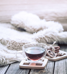Still life cozy atmosphere with a cup of tea