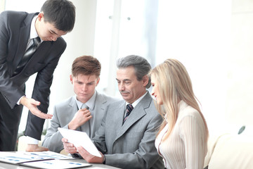 business team discusses new ideas at the office table