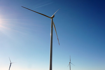 Eco power, wind turbines with blue sky. wind turbine for alternative electricity.renewable electric...