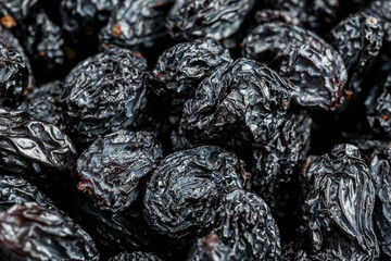 Black Raisin texture, popular dried fruit. Dried grapes.