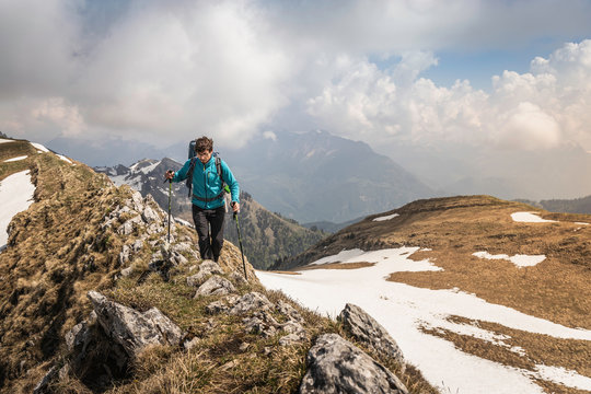 Hiker trekking French Alps, Parc naturel r&iacute;&copy;gional du Massif des Bauges, Chatelard-en-Bauges, Rhone-Alpes, France