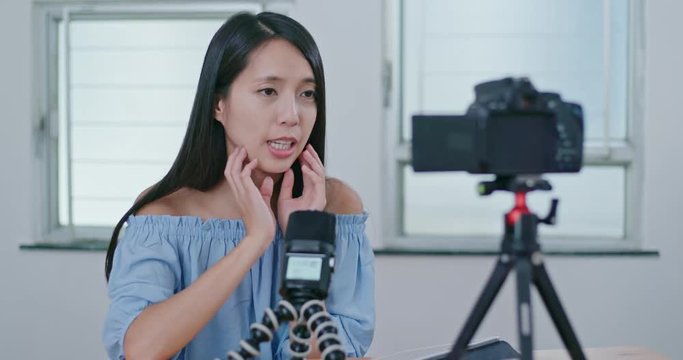 Woman talk to camera for making vlog