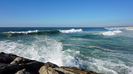 rough waves touching coast of portugal in autumn