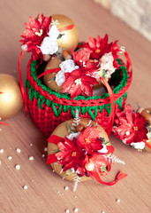 Christmas balls for tree in wicker red basket
