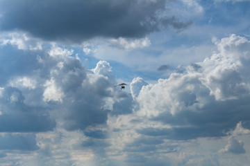 hang glider in the blue sky