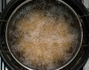 fryer filled with boiling oil
