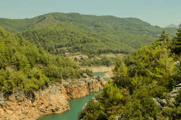 Fototapeta na wymiar River and mountains on a summer day