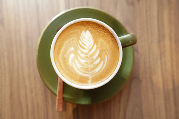 Latte hot coffee in the cup, to refresh in the morning.