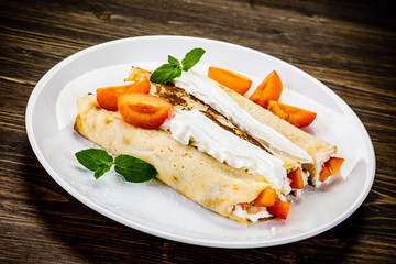 Sweet crepes with apricots