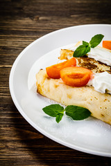 Sweet crepes with apricots