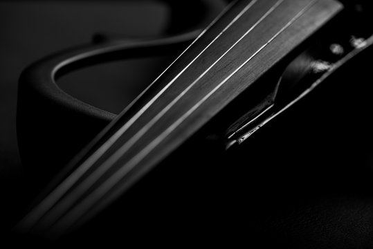 electronic violin on a black background 