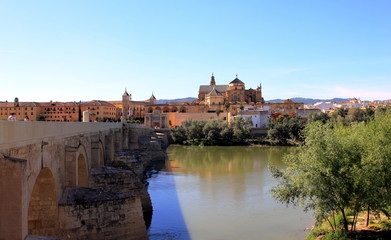 Cordoba Spain. Roman Bridge on Guadalquivir river and The Great Mosque in the city of Cordoba, Andalusia.