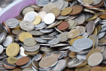 old coins from various parts of the world withdrawn from circulation