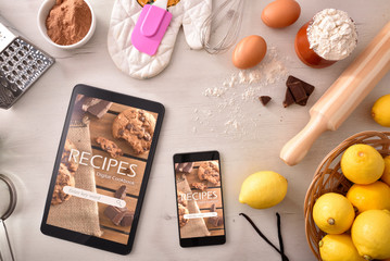 Using digital cookbook app in devices in pastry - obrazy, fototapety, plakaty