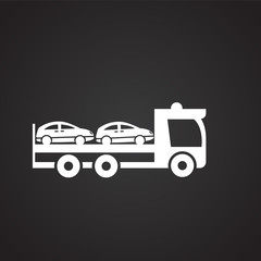 Car transporter on black background icon