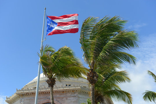 Flag of the Commonwealth of Puerto Rico in front of Capitolio, San Juan, Puerto Rico.