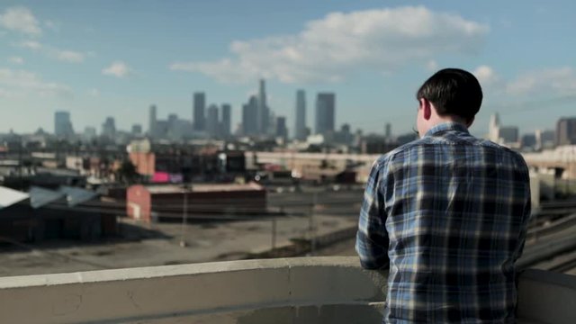 Man Standing in Front of Los Angeles Skyline 