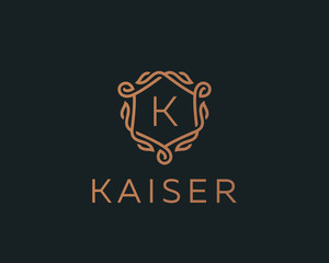 Premium linear shield monogram letter K logotype. Elegant crest leaf stamp icon vector logo. Luxury alphabet frame symbol.