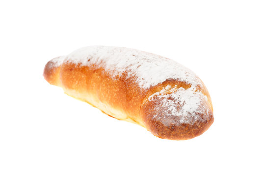 Traditional Bulgarian breakfast dish named Lokumka or Kifla made from slightly sweetened dough, powdered sugar icing and turkish delight or marmalade filling. Isolated on white background