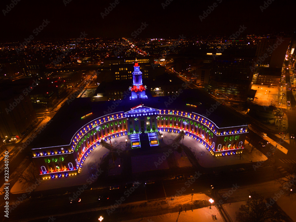 Wall mural Aerial/Drone photo of Christmas holiday lights on the city of Denver government building.  Denver, Colorado