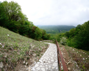 Stone path in mountains with beautiful view