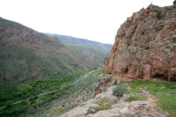 scenery with red rocks in mountains in Noravank (Armenia)
