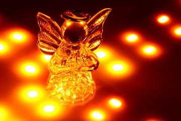 illuminated christmas angel made of glass close up