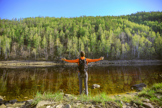 Tourist in Tynda Town and Tynda River in Blagoveshensk Region in Siberia in Far East of Russia