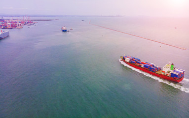 Obraz premium Logistics and transportation of Container Cargo ship and Cargo import/export and business logistics,Aerial view from drone