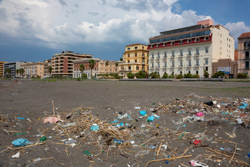 Plastic waste and rubbish on the beach in castellammare di stabia Italy - 232345985