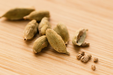Green cardamon dry seeds,  pods,  closeup macro shot