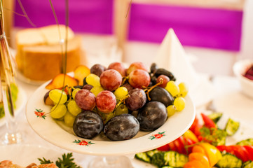 Dish with colorful fruit mix
