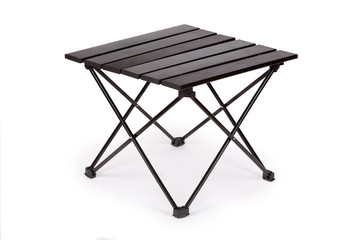 Black folding table for camping on white background