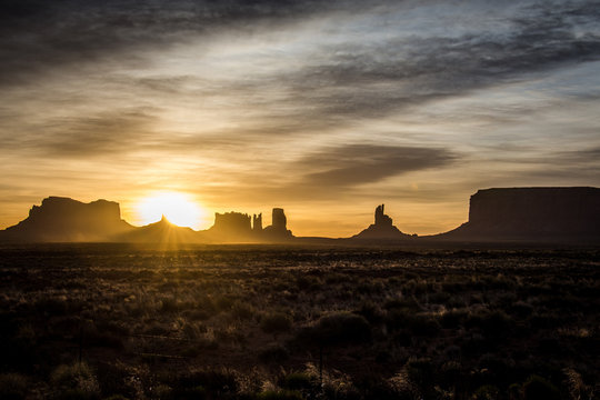 Sunrise and sunburst in Monument Valley in the Southwestern United States in the Four Corners region