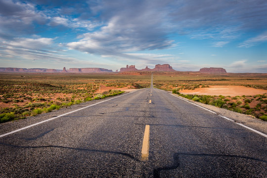 The road leading to Monument Valley, an area of giant red rock formations on the Arizona and Utah border, at sunrise