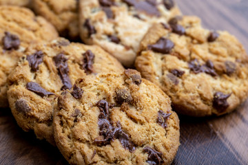 Details of a cookie with many drops of creamy and crunchy chocolate. Chocolate cookies.