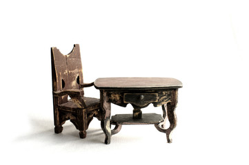 furniture is wooden antique. table and chair miniature. isolate on white background.