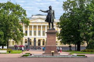 Monument for poet Alexander Pushkin on Culture square with Russian museum at background, St....