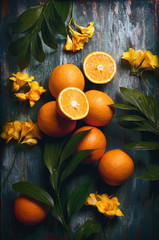 flatlay food background - empty wooden board with mint oranges and knife, with copy space